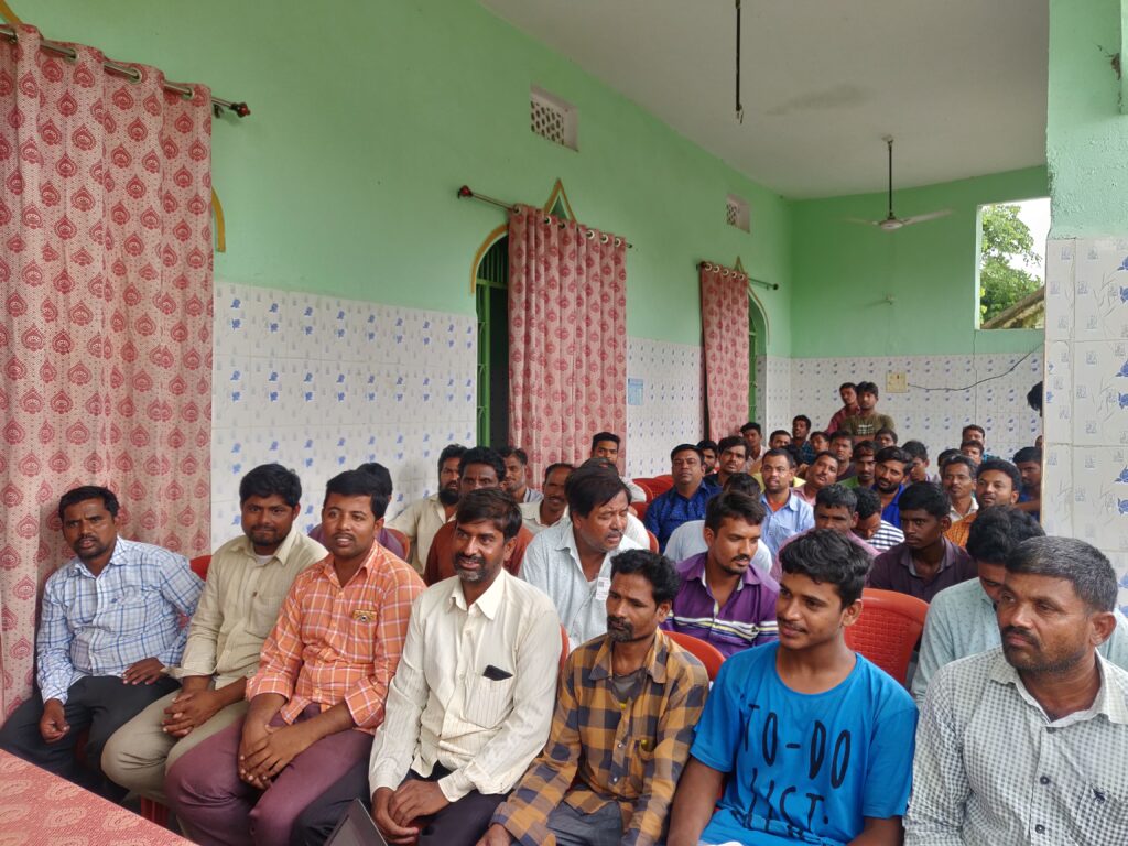 group of people using laptop computer